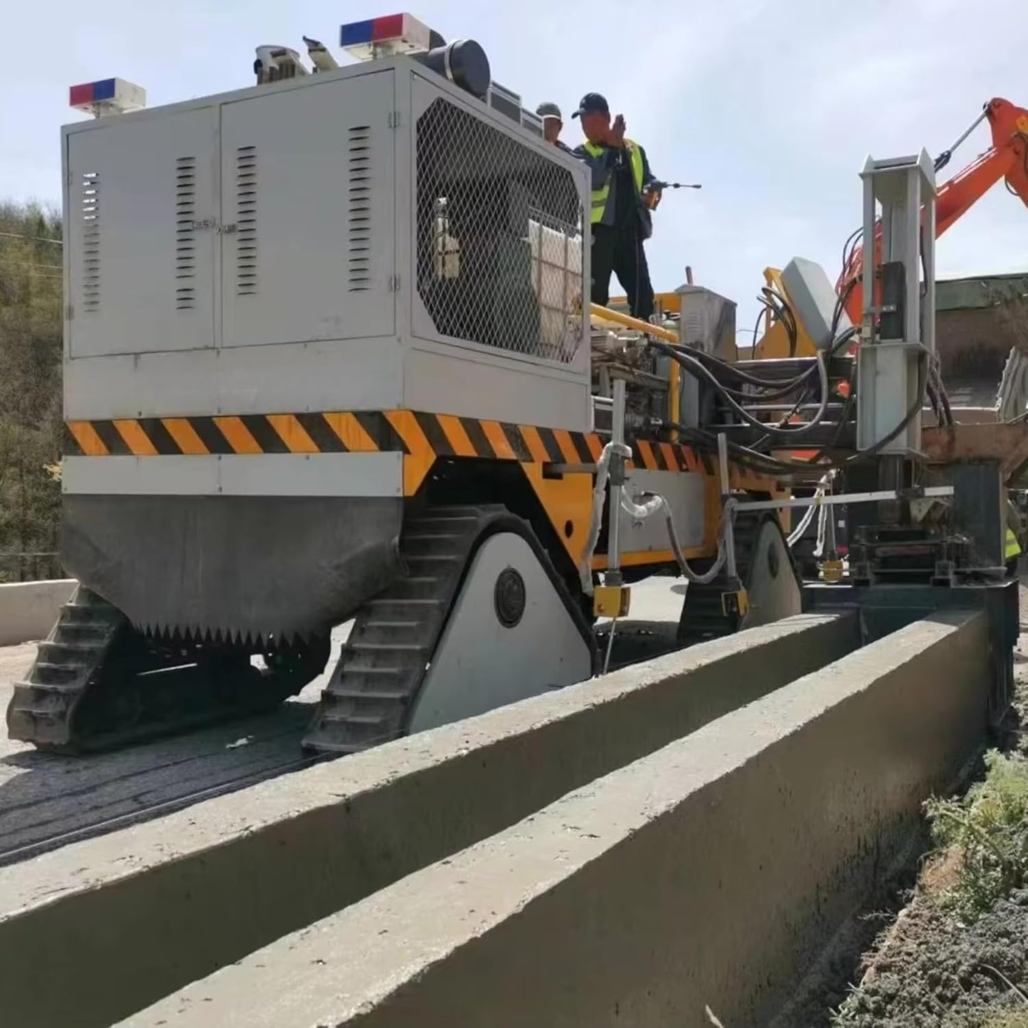 automatic slipform curb paver,best slipform curb paver,slipform curb paver pros cons,stringless curb and gutter machine,GPS ready concrete curb machine,should I buy a slipform curb paver unboxing and complete package contents